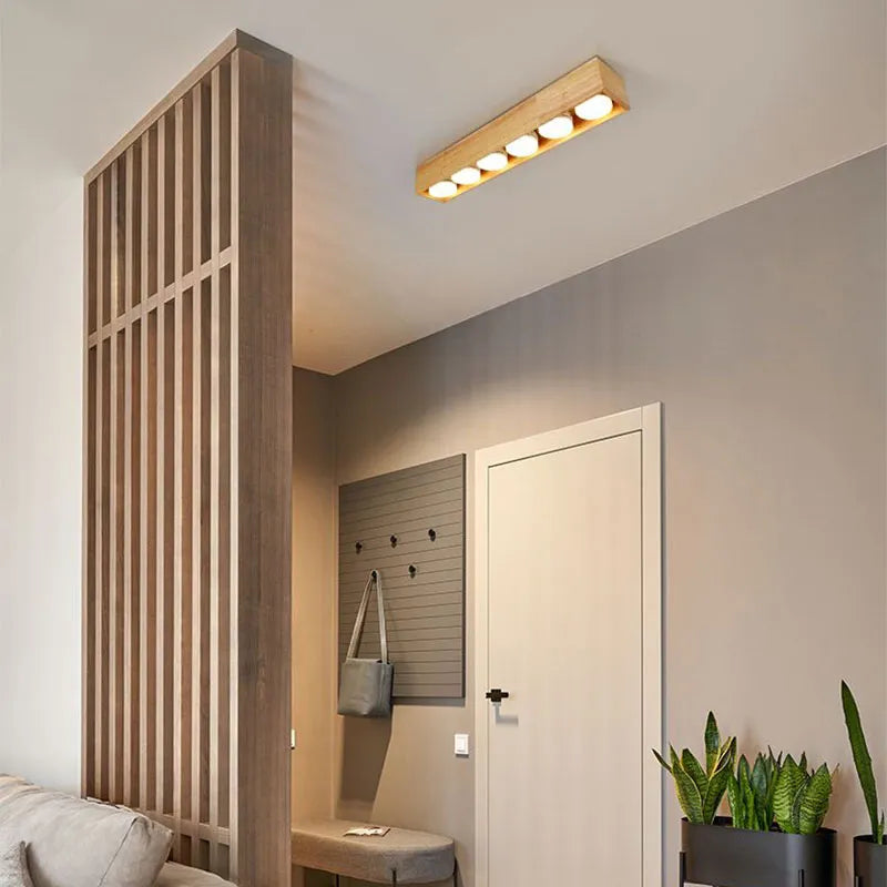 luz de teto minimalista madeira crua interior quarto escritório corredor vestiário