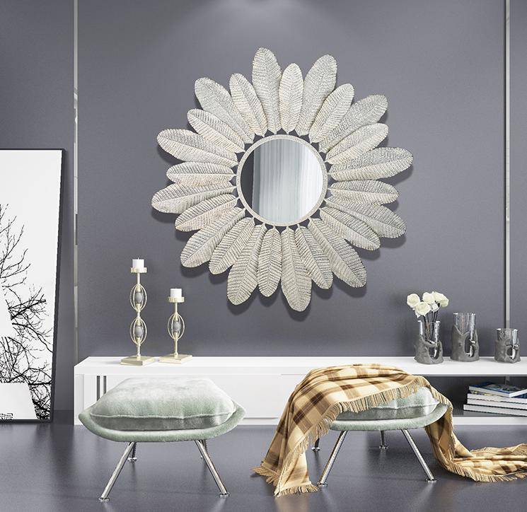 Espelho redondo de parede com decoração de penas brancas