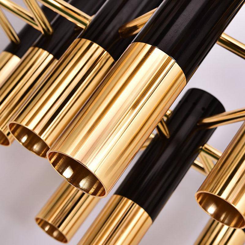 Lustre de design com tubos de metal preto e dourado Itália