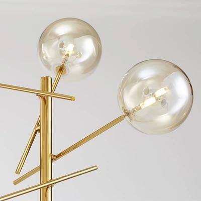 Candeeiro de pé LED dourado com ramos e bolas de vidro giradas